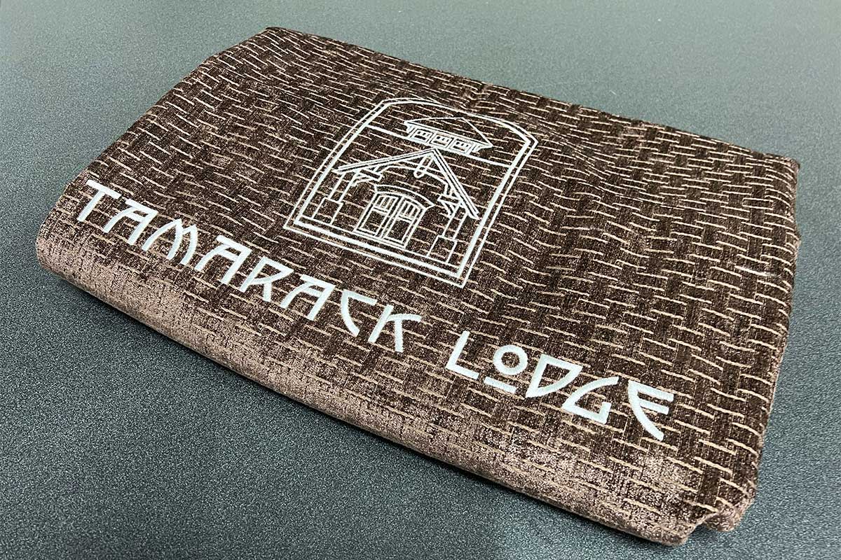 Embroidered hotel blanket